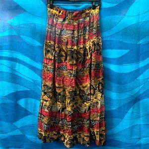 709 Billie Martin, size large Colors, orange, brown tan, red, white, and black